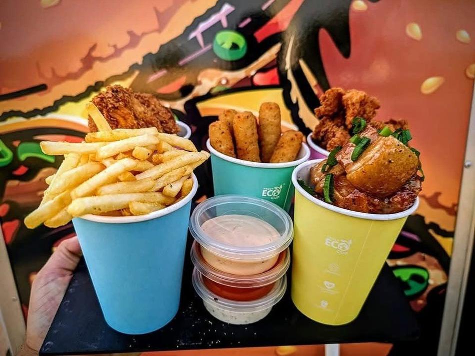 Chicken tenders, mozzarella sticks, wings and chips served in cups with dipping sauces